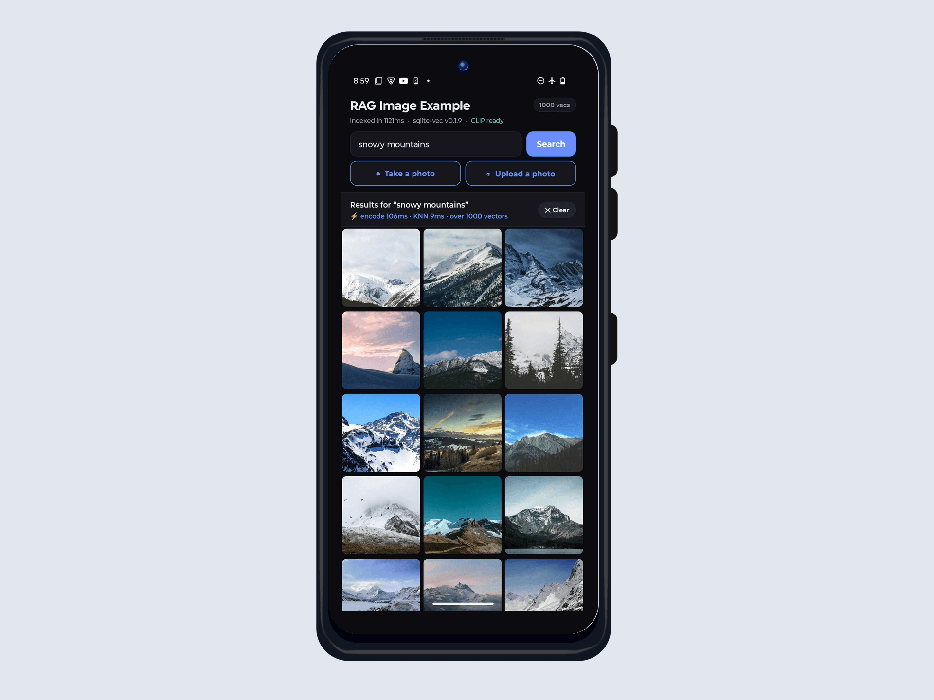Typing "snowy mountains" surfaces a grid of snow-capped peaks, encoded and searched entirely on the phone